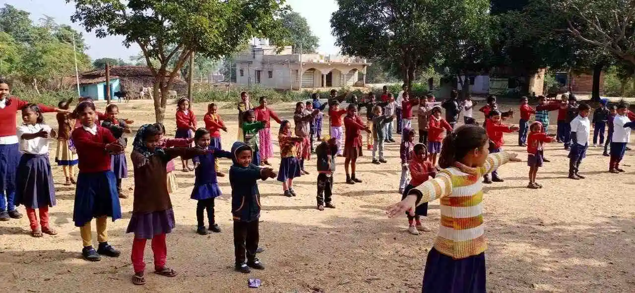 Children participating in educational activities at Little Keb School